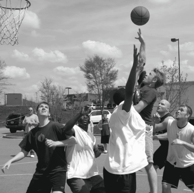Kids playing basketball outdoors at Rolling Hills Community Church.